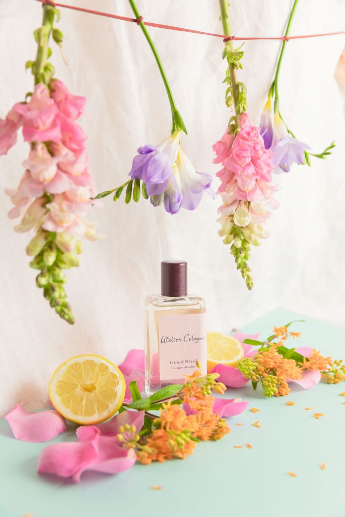 Creative photography and styling for Atelier Cologne in colorful pastel flowers