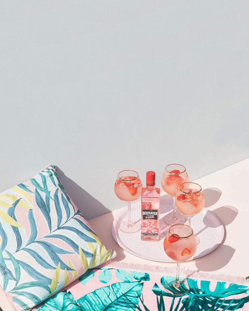 Creative summer photography and styling for pink beefeater gin